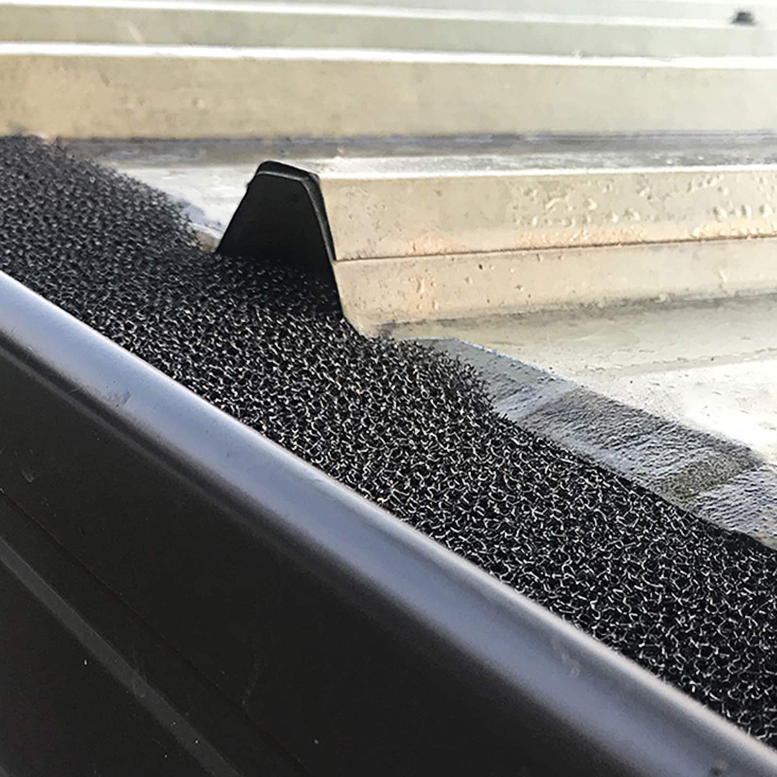 Close up of newly installed foam gutter gaurds.