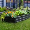 Set of modular raised garden beds made from durable material, ideal for backyard vegetable or herb gardening.