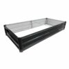 Fully assembled modular garden bed with sleek black panels, perfect for growing vegetables in backyard spaces.